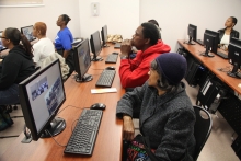 Students attend a computer class at the Dearborn Homes Technology Center