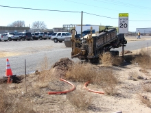 ENMR crews drill a hole to install fiber at the project’s second market site.