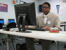 A Boys & Girls Club Youth member hard at work on a computer